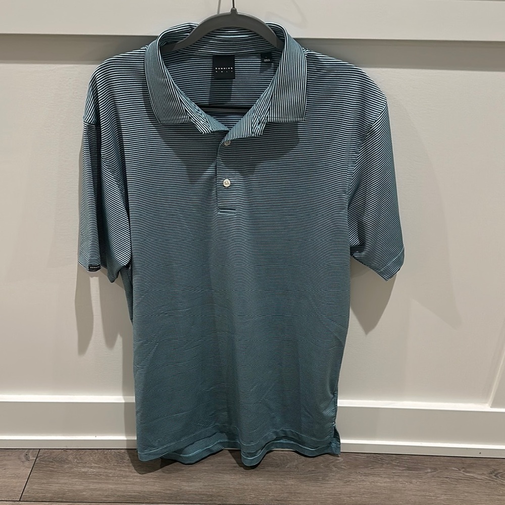 Blue Polo Shirt with Classic Design and Short Sleeves